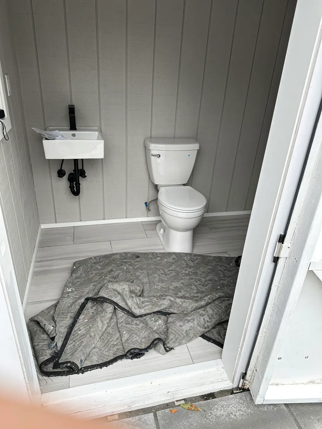 PVC drain, waste and vent rough-in run between floor joists